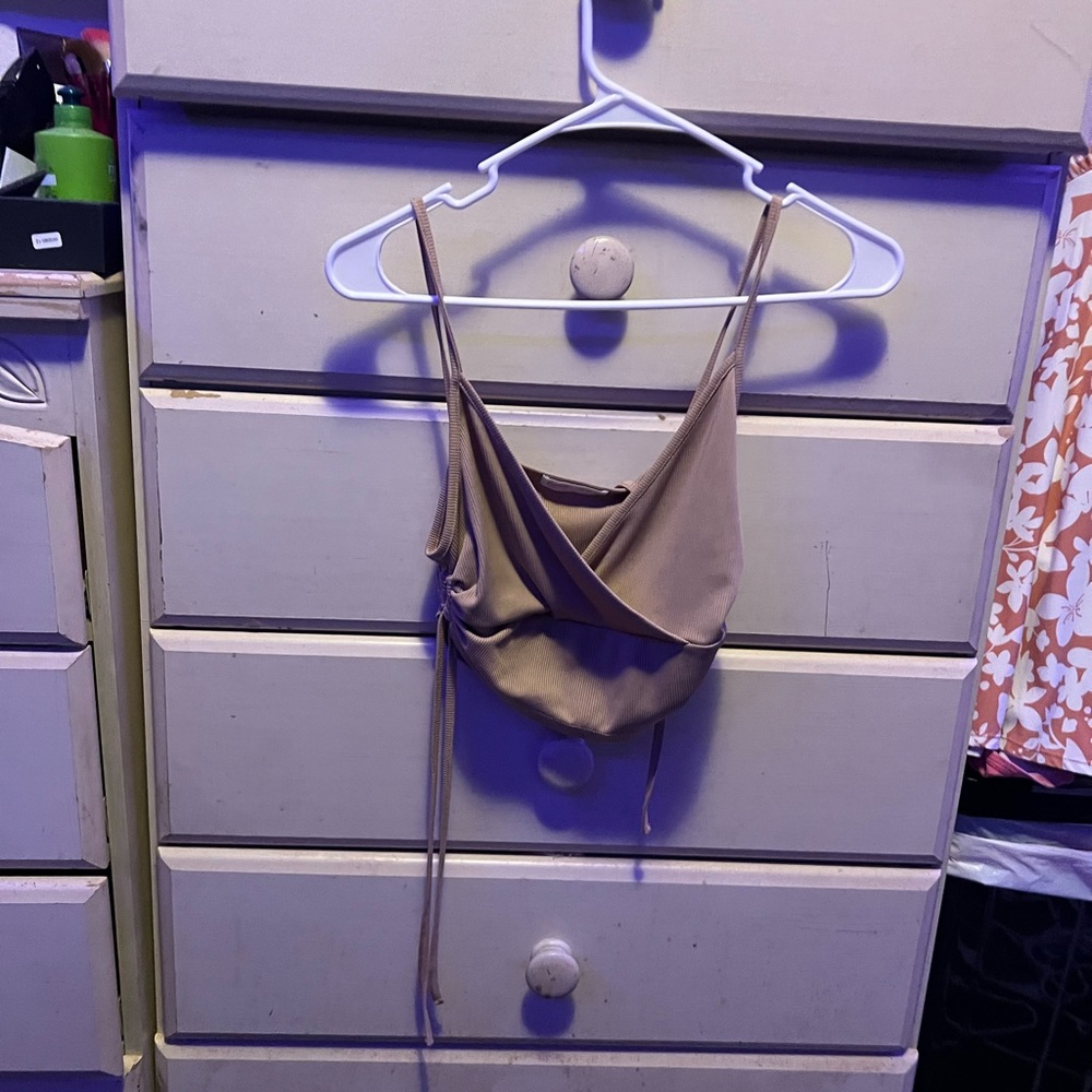 tan size small tie top (ties located on sides)